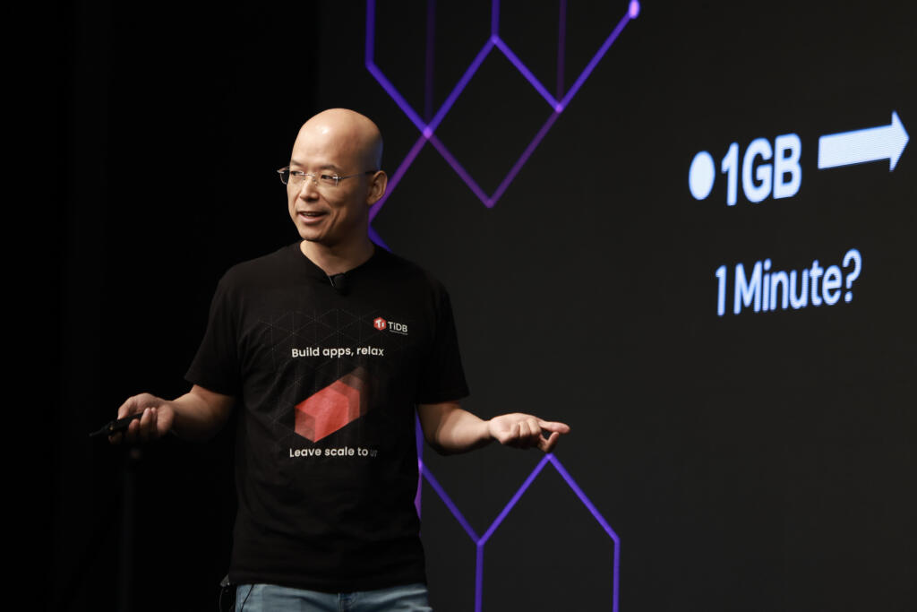 PingCAP Co-Founder and CEO Max Liu on stage talking about database scaling during his keynote at HTAP Summit 2024.